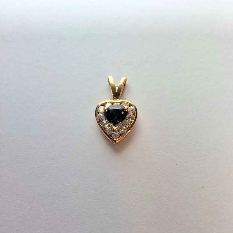 9ct Yellow Gold Sapphire style pendant surrounded with cubic zirconia