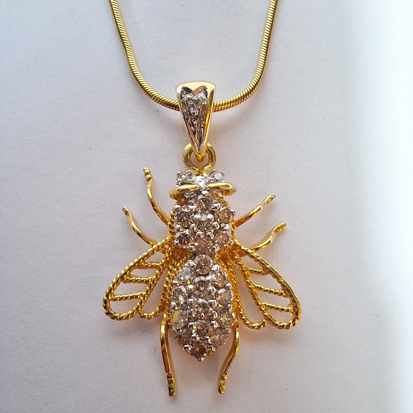 18ct Yellow Gold Diamond Cluster Insect Bee pendant on a 9ct Gold Snake chain