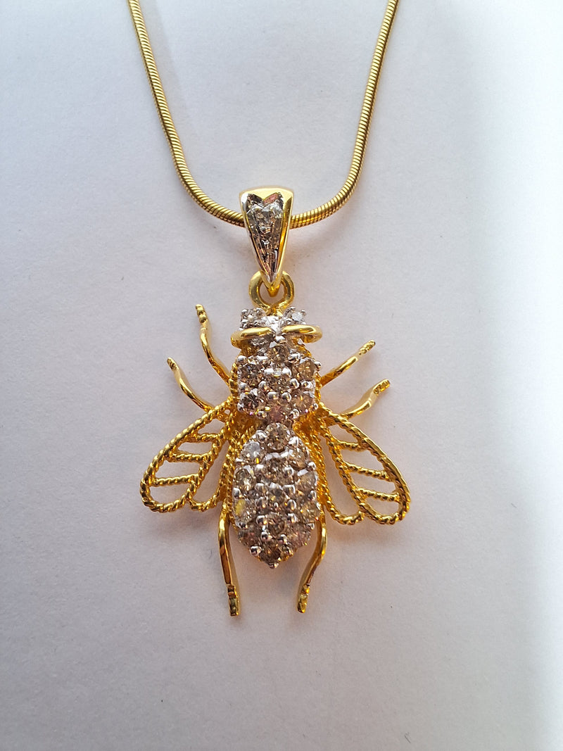 18ct Yellow Gold Diamond Cluster Insect pendant on a 9ct Gold Snake chain