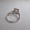 New Princess Cut 0.72ct Lab Grown Diamond with twenty round brilliant Cut Lab Grown Diamonds around the edge all on a Platinum Band