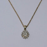 Vintage 9ct Diamond star cluster pendant on a 9ct rope chain