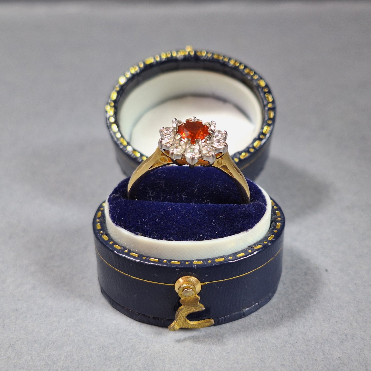 18ct Gold Fire Opal and Diamond Halo Ring