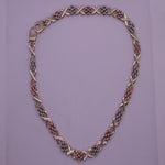 Vintage Kiss linked three coloured 9ct Gold chain