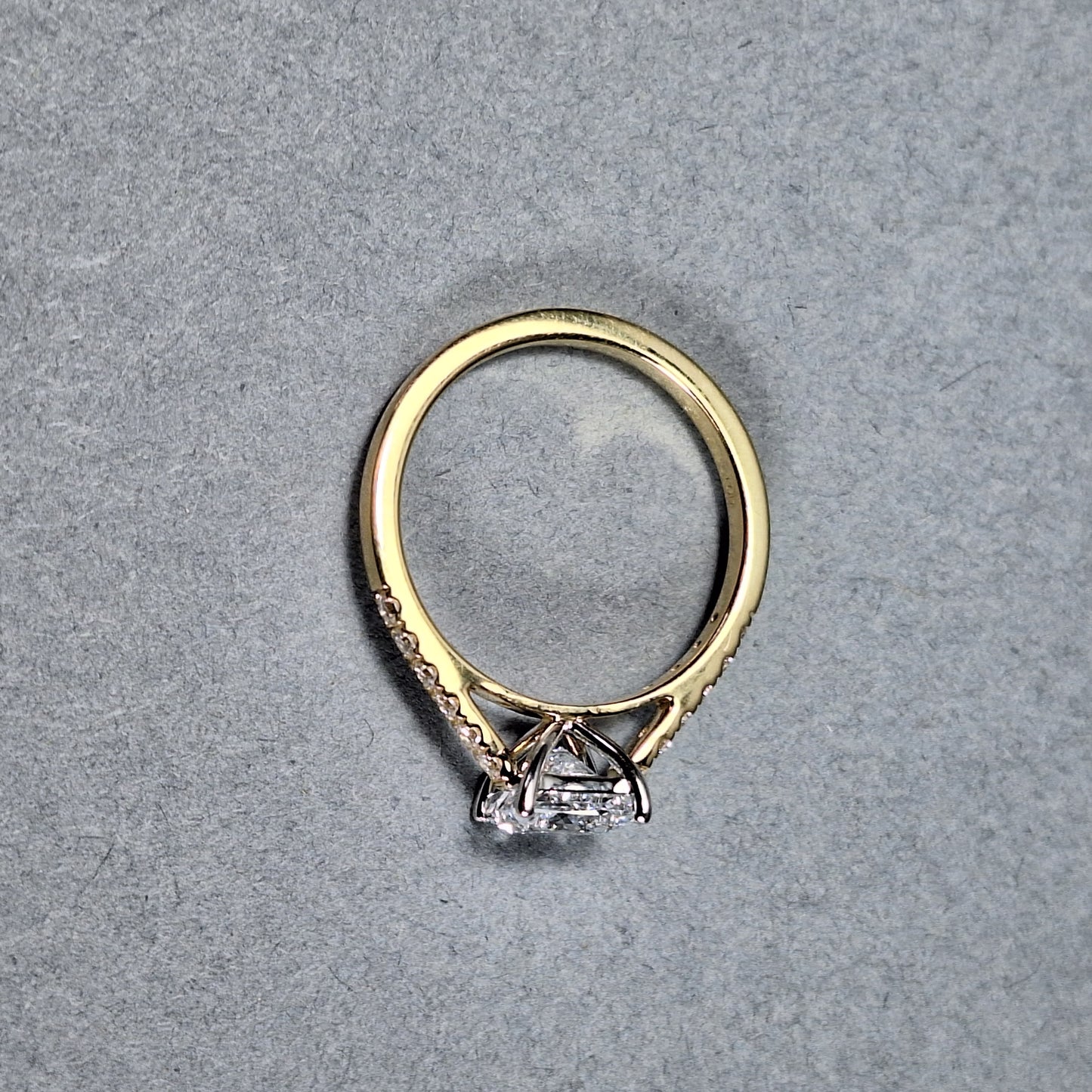 New Princess Cut 0.9ct Lab Grown Diamond & twelve Round Brilliant Cut Lab Grown Diamonds down the sides all placed on an 18ct Yellow gold Band