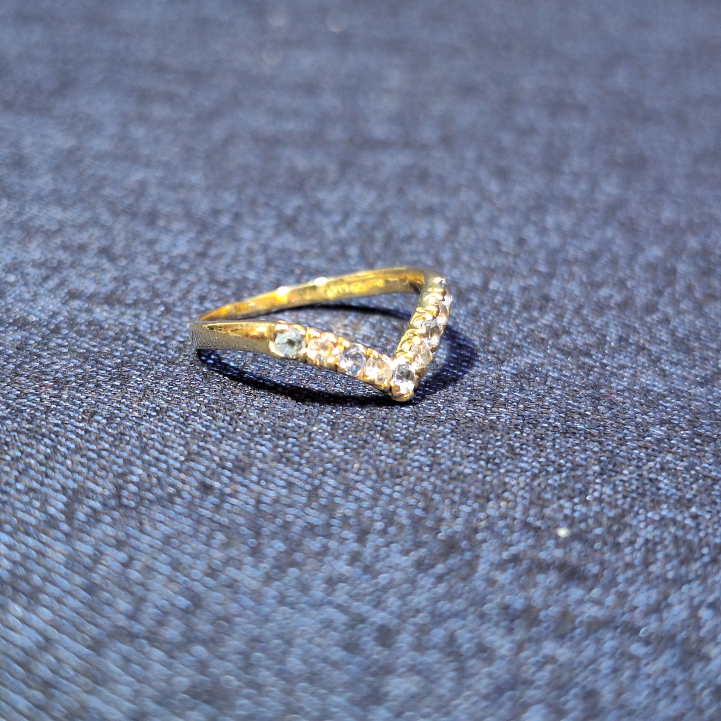 18ct half wish bone with cubic zirconia & blue topaz