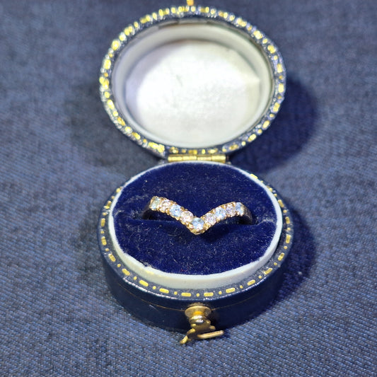 18ct half wish bone with cubic zirconia & blue topaz