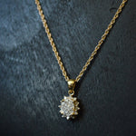 Vintage 9ct Diamond star cluster pendant on a 9ct rope chain