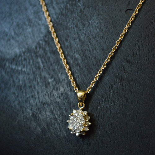 Vintage 9ct Diamond star cluster pendant on a 9ct rope chain