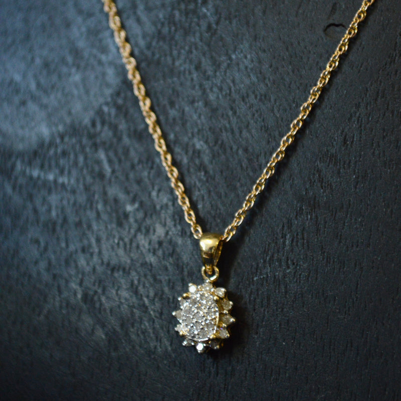 Vintage 9ct Diamond star cluster pendant on a 9ct rope chain