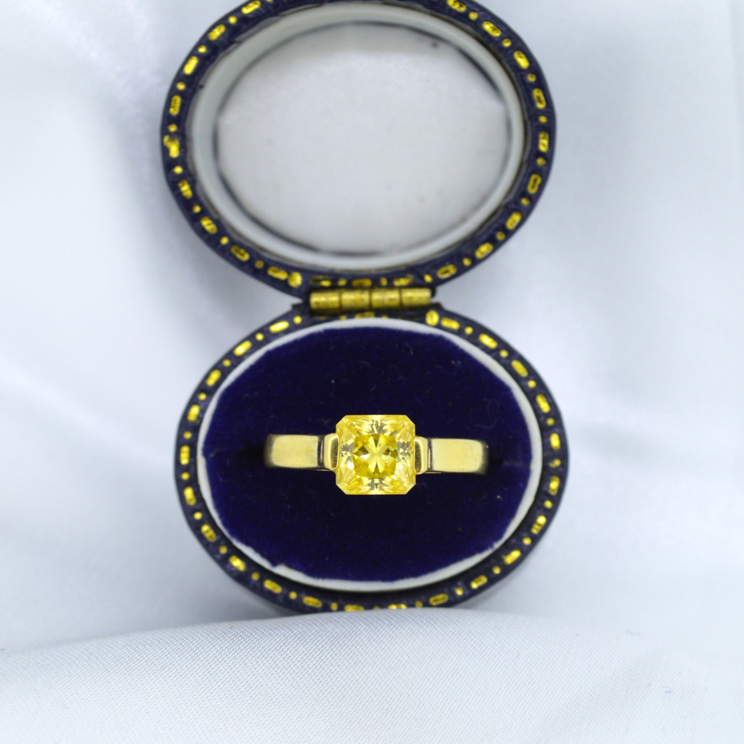 18ct Yellow Gold & tension-set Yellow Sapphire Ring