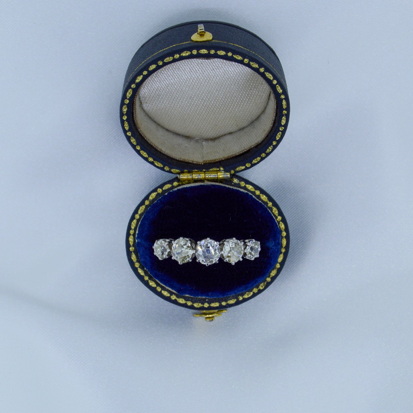 Vintage Five Stone Old-Cut Diamond ring on a Platinum band