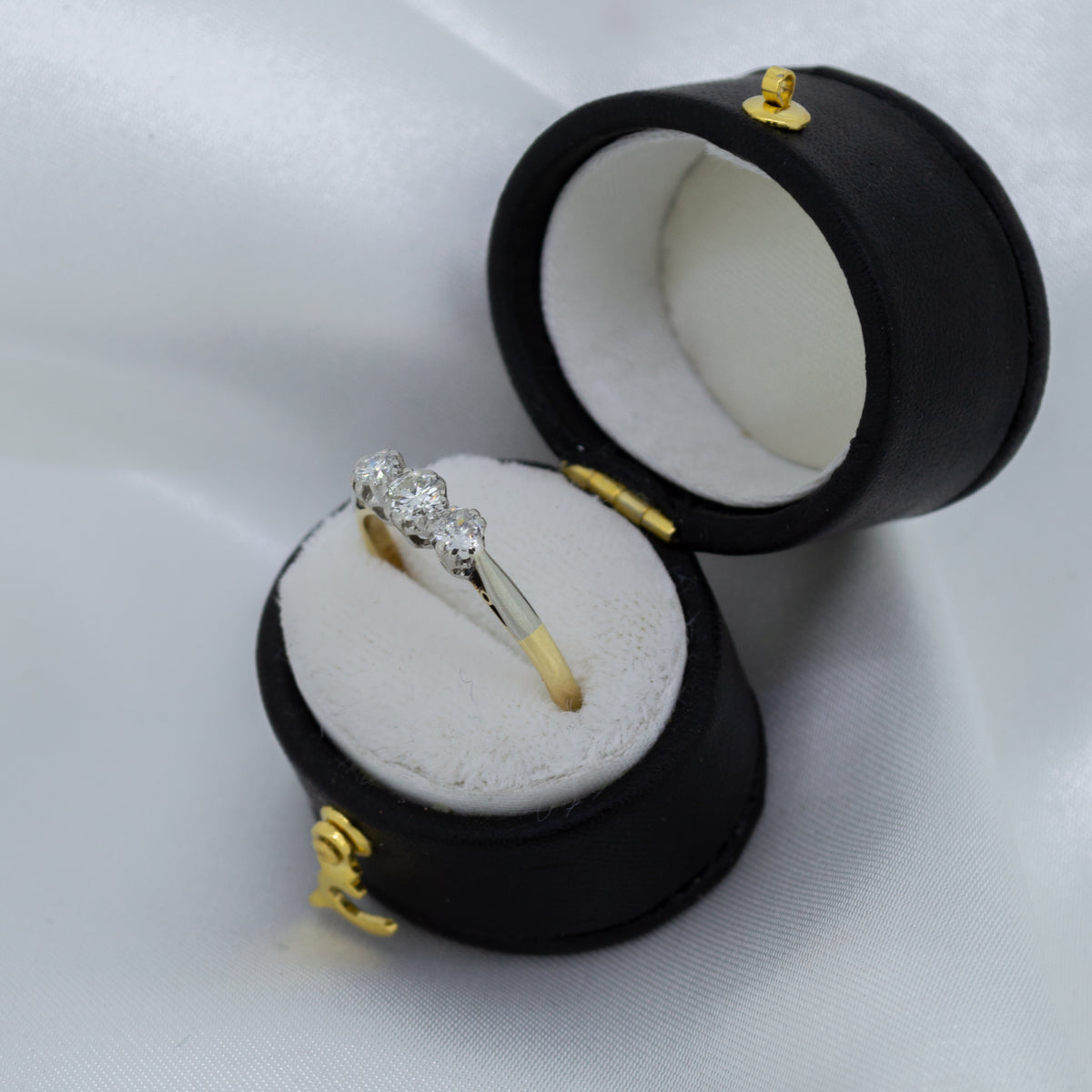 Vintage 18ct three-stone old cut Diamonds
