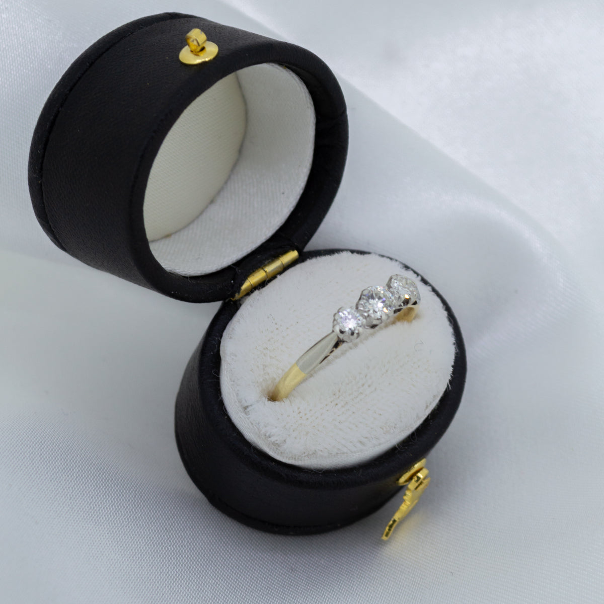 Vintage 18ct three-stone old cut Diamonds