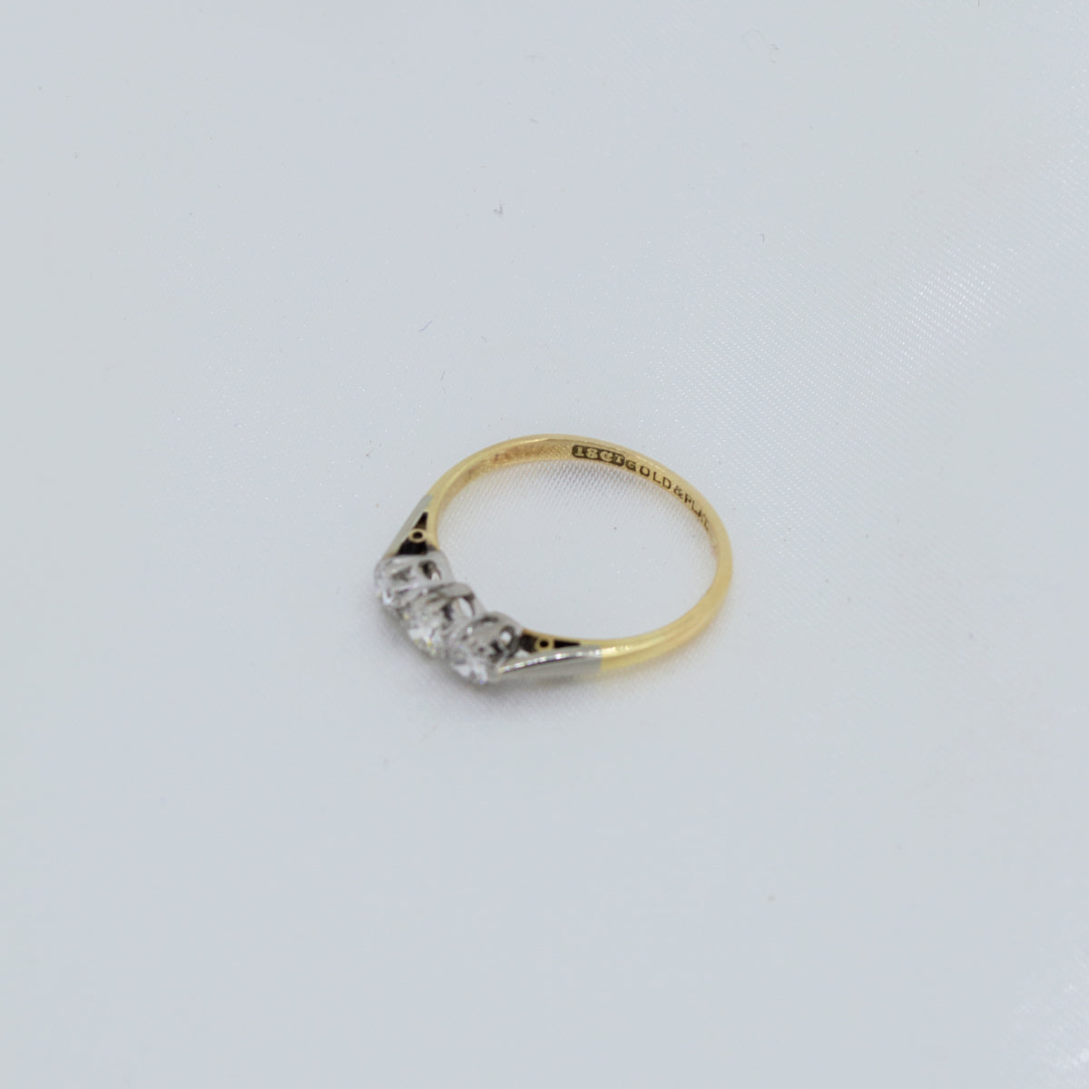 Vintage 18ct three-stone old cut Diamonds
