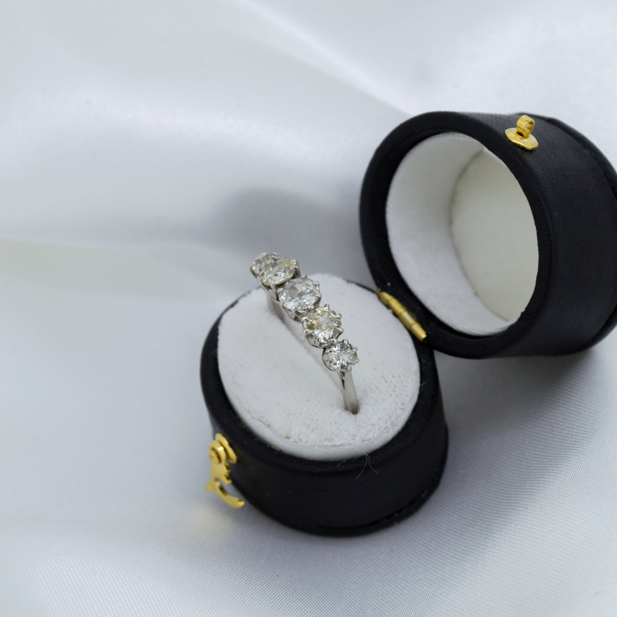 Vintage Five Stone Old-Cut Diamond ring on a Platinum band
