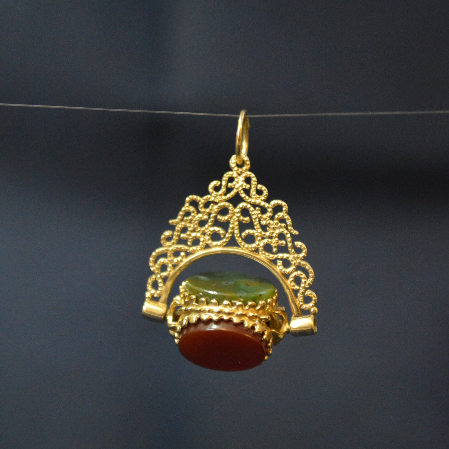 Vintage 9ct yellow gold three coloured stoned fob