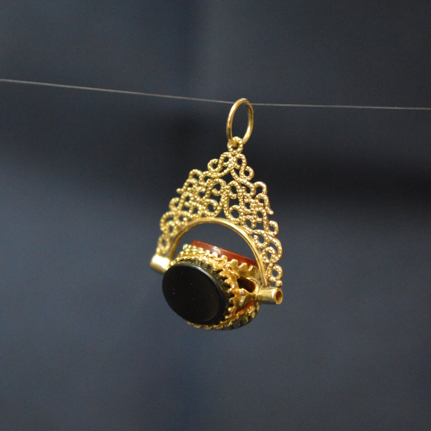 Vintage 9ct yellow gold three coloured stoned fob