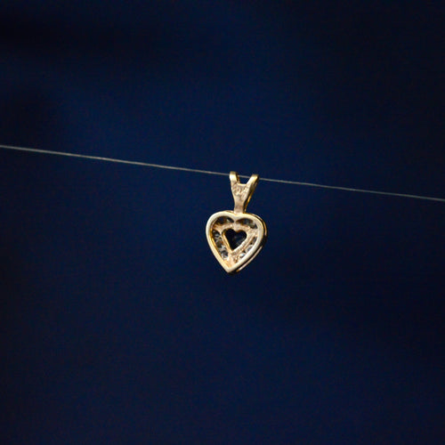 9ct Yellow Gold Sapphire style pendant surrounded with cubic zirconia
