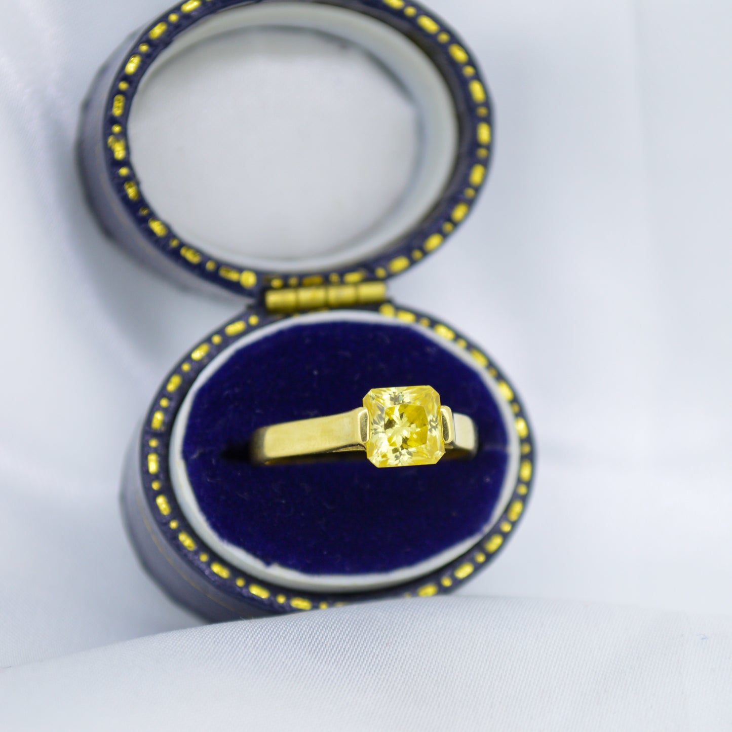 18ct Yellow Gold & tension-set Yellow Sapphire Ring
