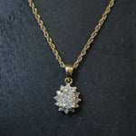 Vintage 9ct Diamond star cluster pendant on a 9ct rope chain