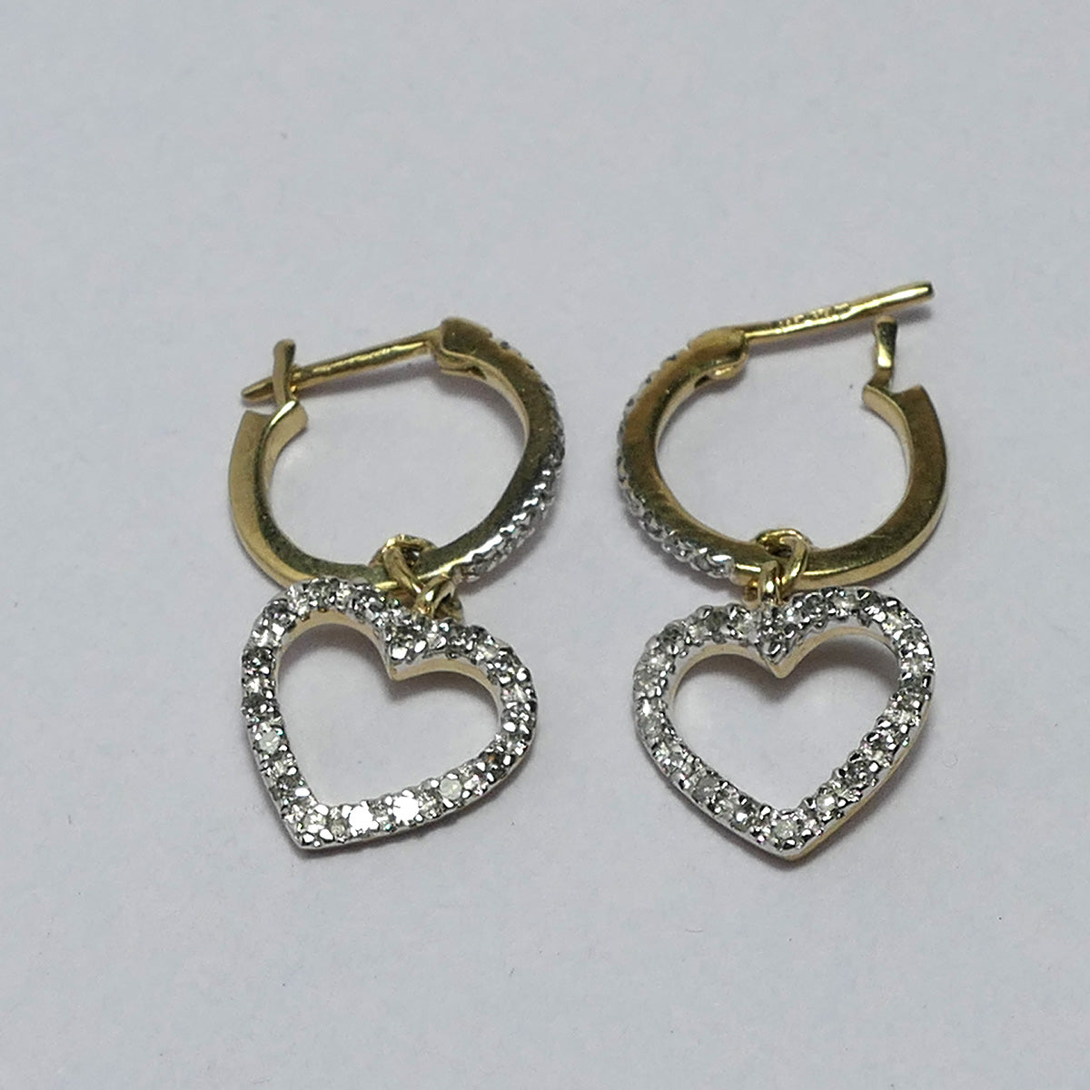 9ct yellow Gold earring hoops decorated with cubic zirconia