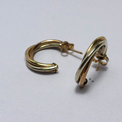 Three coloured 9ct Gold twisted half hoop earrings studs