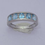 9ct White Gold, Blue topaz and Diamond Dress Ring