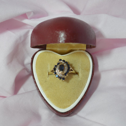 Vintage 9ct ring with multiple deep blue sapphires