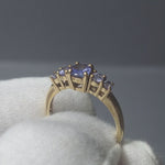 Five stoned Tanzanite 9ct Yellow gold ring