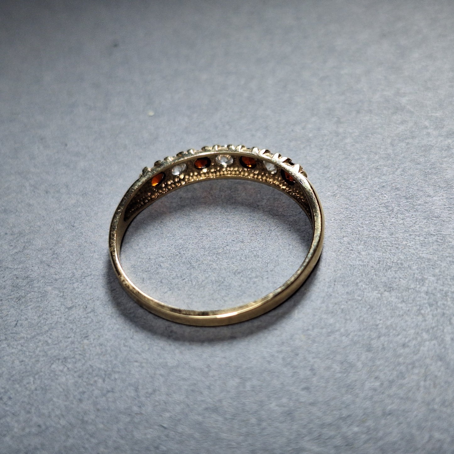 9ct Yellow gold clear & red cubic zirconia 1/4 eternity ring