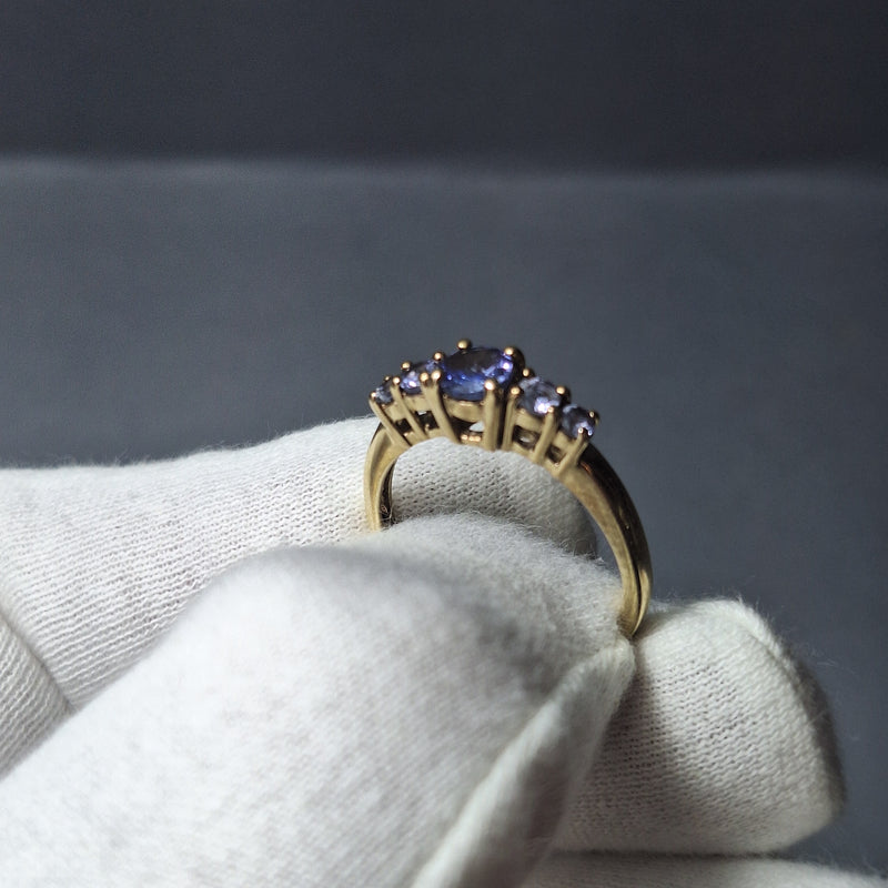 Five stoned Tanzanite 9ct Yellow gold ring