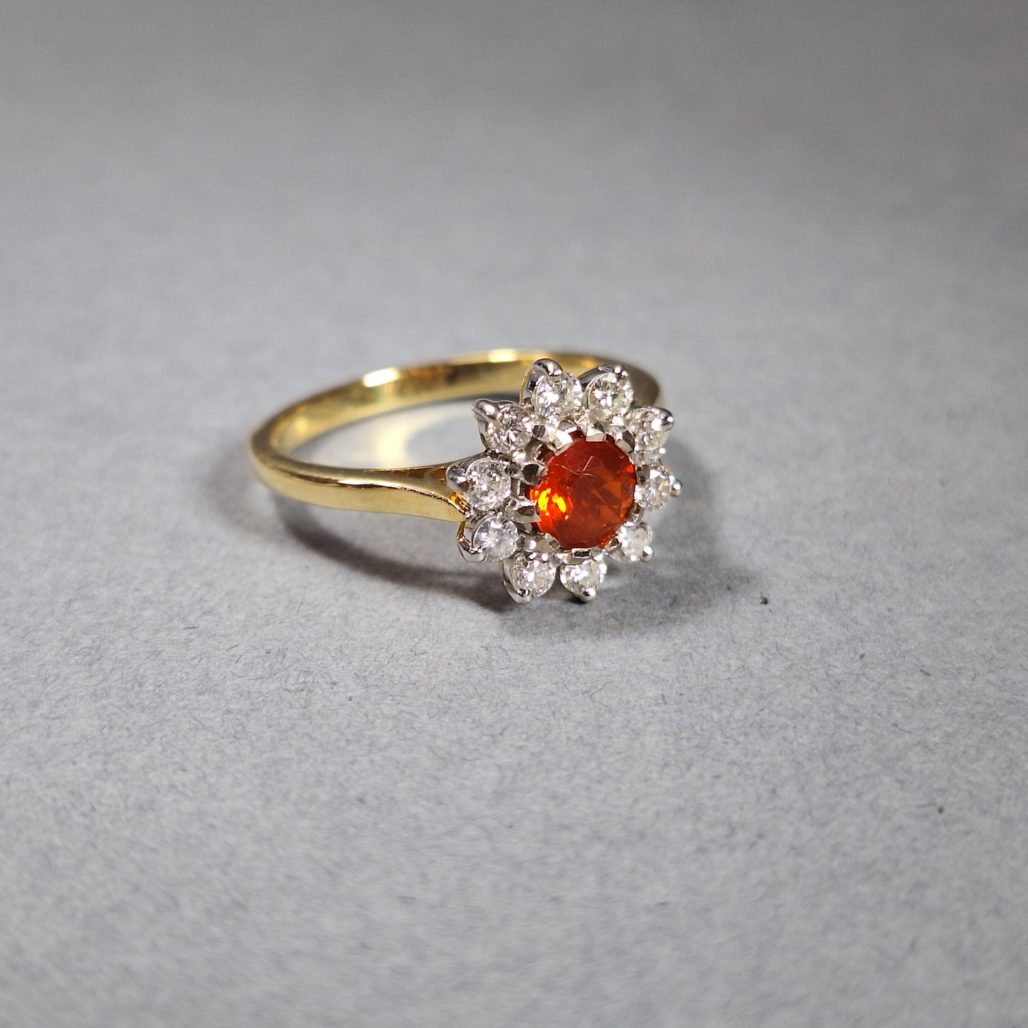 18ct Gold Fire Opal and Diamond Halo Ring
