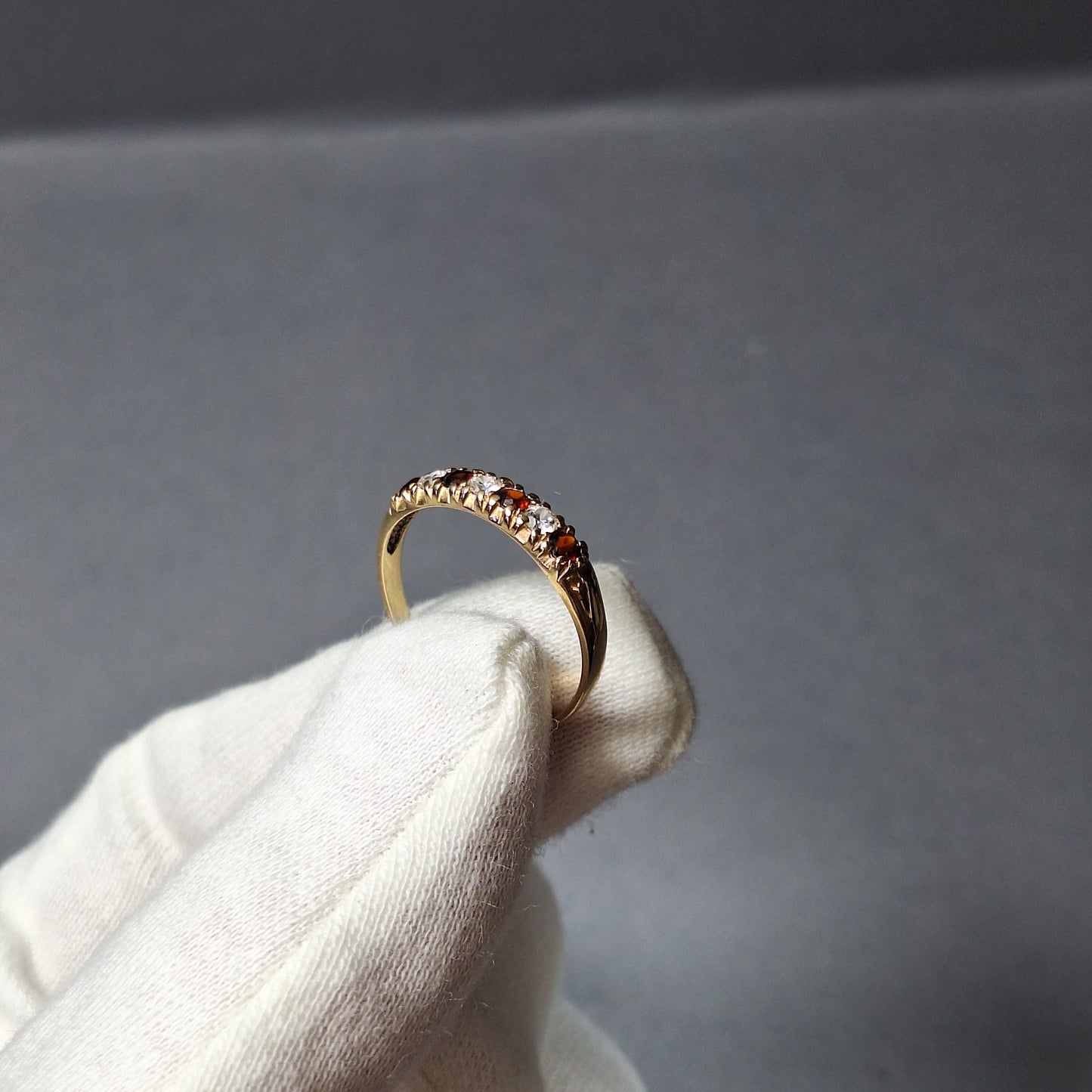 9ct Yellow gold clear & red cubic zirconia 1/4 eternity ring