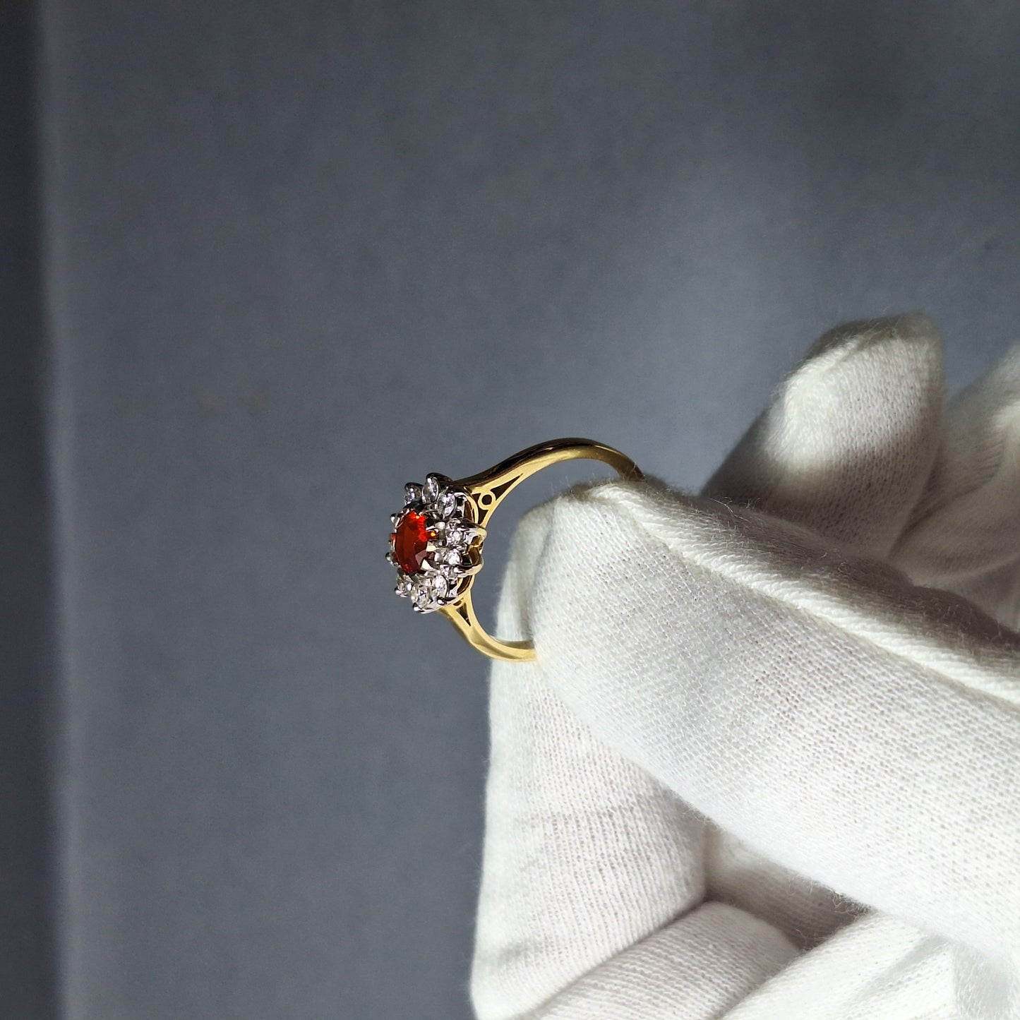 18ct Gold Fire Opal and Diamond Halo Ring