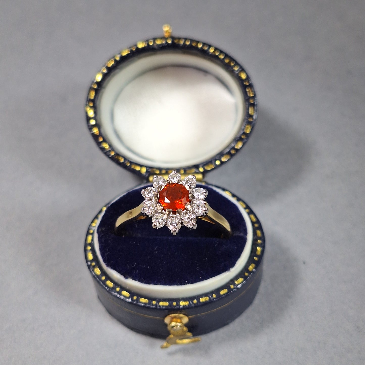 18ct Gold Fire Opal and Diamond Halo Ring