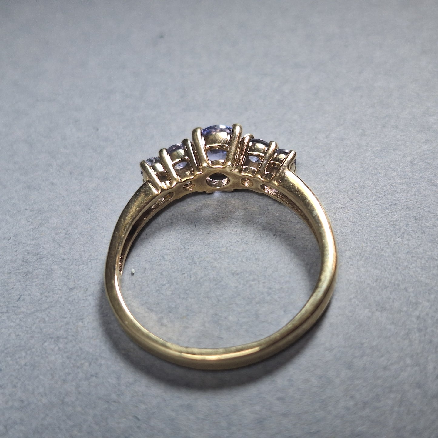 Five stoned Tanzanite 9ct Yellow gold ring