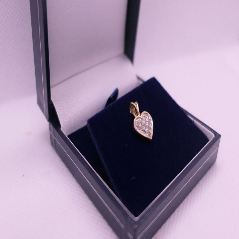 9ct Gold Heart Shaped Diamond Pendant with Princess Cut Diamonds